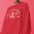 Christmas sweatshirt with "SEASONS SCREAMINGS, DARKLING" text arched over a skull wearing Santa hat. Bats, flowers, and ornate designs surround the skull in vintage-inspired style.